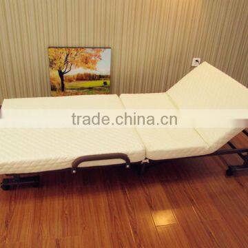 white guest room metal folding bed