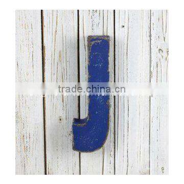 Wall mounted metal letter with distressed tin finish