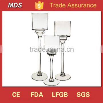 Clear glass candle holder goblet with long stem