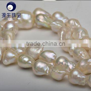 cream white 11-13mm AAA grade nucleated baroque pearls string wholesale