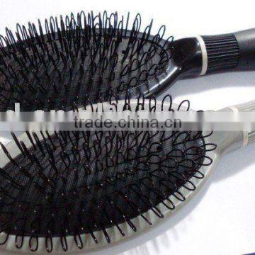 Loop hair extension brush