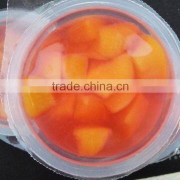 fruit jelly in cup in light syrup