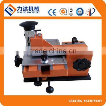 Tag metal embossing machine