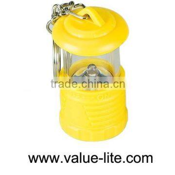 Hot sales plastic led keychain light shaped different small camping lantern