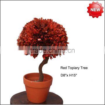 Red preserved boxwood topiary