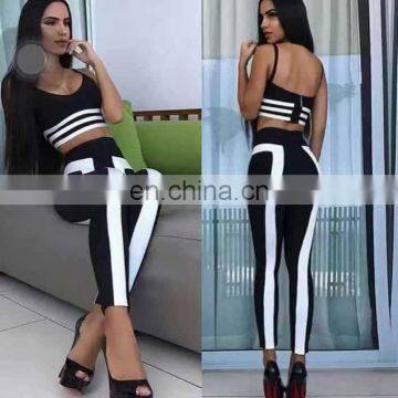 Amigo 2017 new design two pieces black and white strap crop top and long bodycon punts tight bandage jumpsuit for leggy women