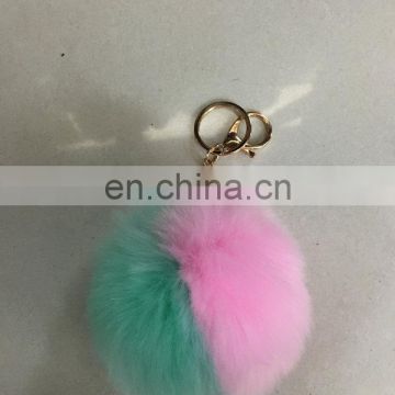 faux fur bag charm tiedye pom pom