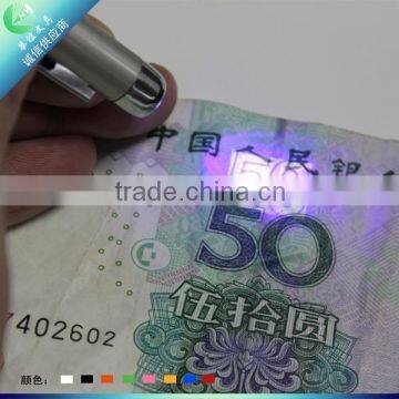 Silver metal laser light pen with UV for inspection notes