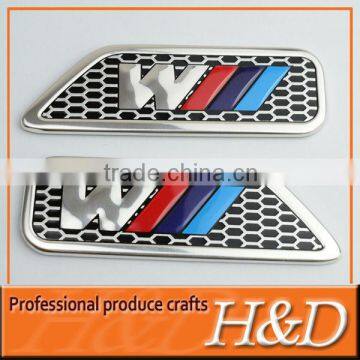 car logo badge with sticker on backside