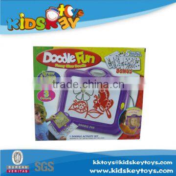 Kids painting electronic drawing board with light