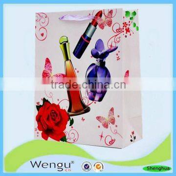 Yiwu printed glitter lady gift paper bag with handle ribbon handle made in china supplier and manufacture