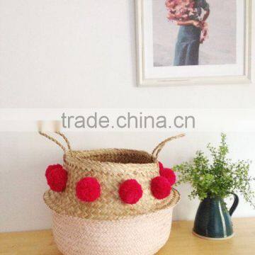 High quality best selling eco-friendly Natural & Pink seagrass storage basket with red pompoms from Vietnam