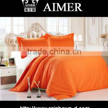 Trade assurance 100% cotton anti-pilling solid orange color fabric for comforter bed sheet/quilting bedding home textile