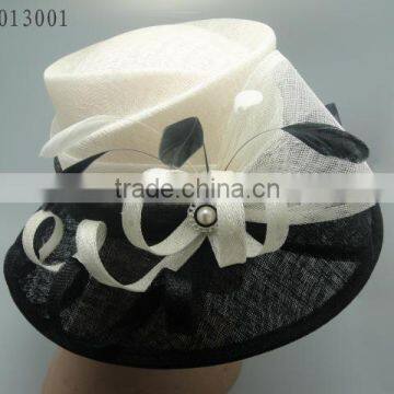white and black church hat with pearl decoration