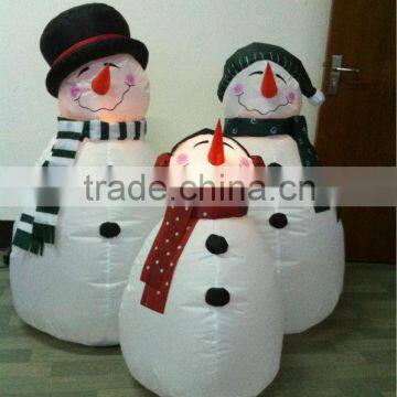 Inflatable snowman family