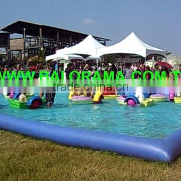 Paddle boats and inflatable pool