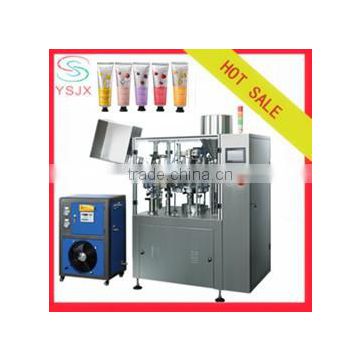 Automatic plastic tube filling and sealing machine