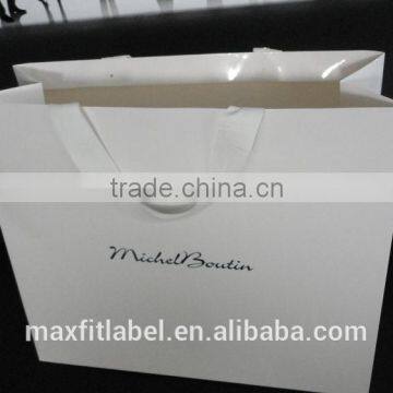 Qingdao custom garment paper packing bag,paper packing bag,packing bag with your logo