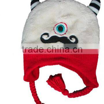 white coral velvet hat with red knitted earflap