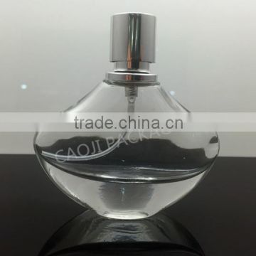 clear glass perfume bottle with aluminum cap