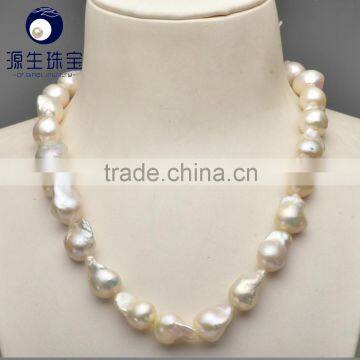 cream white 11-13mm AAA grade nucleated baroque freshwater pearl string wholesale