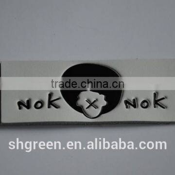 Company brand name leather tag in apparel