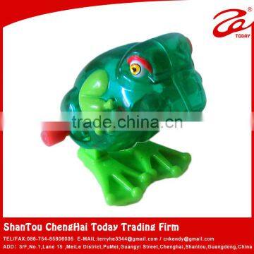 Plastic jumping frog toy