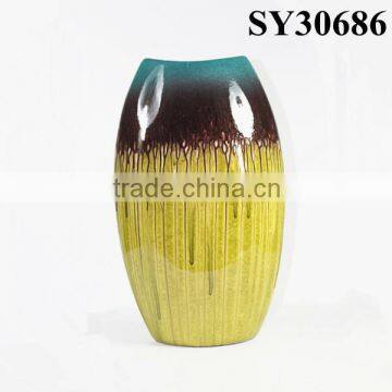 Glazed tall yellow chinese porcelain vase