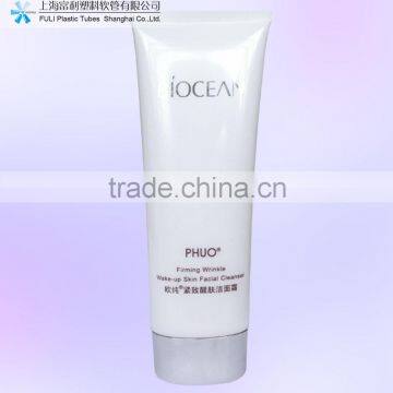 Plastic cosmetic tube with elliptical cap