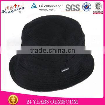 Black woven label cheap bucket hats in cavas