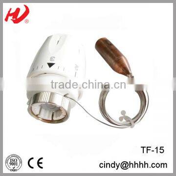 Radiator thermostat head with external sensor