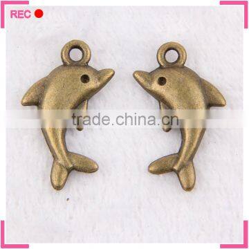 Brass charms for bracelets, dolphin shaped vintage charms