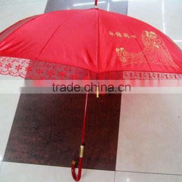 Wedding with festive red umbrella