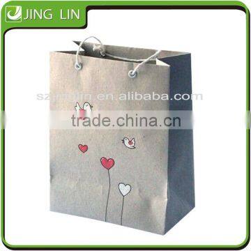 Promotional colorful shopping paper bags with cartoon design manufacturers