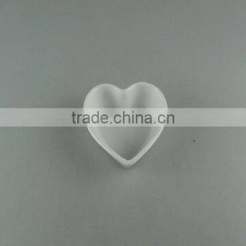 white porcelain heart-shaped dish