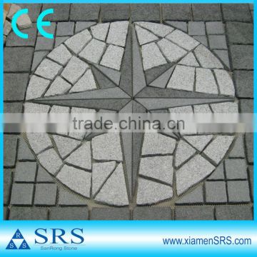 Grey flamed exterior stone medallions