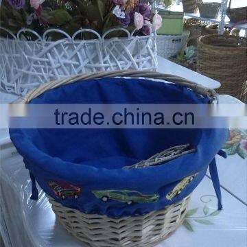 wicker basket with carrying handle and nice lining