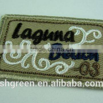 Cotton embroidery label tags with merrow border