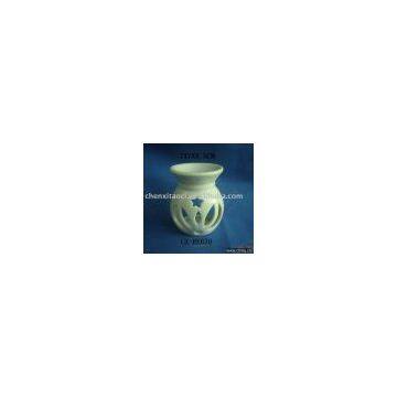 white stoneware oil burner