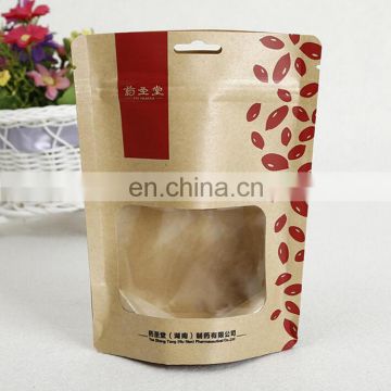 Customized size logo printing brown kraft paper herb paper bag with hang hole and PET clear plastic window