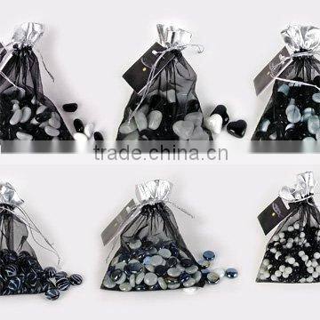 Glass marble with white and black mixed