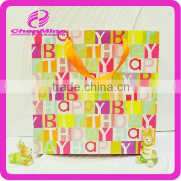 Yiwu custom shopping colorful logo paper bag