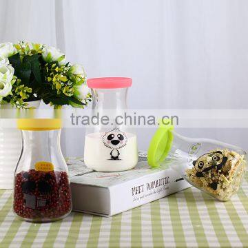 Hot Sale CE Custom Clear Glass Milk Bottle with Silicone Sleeve Cap YH301