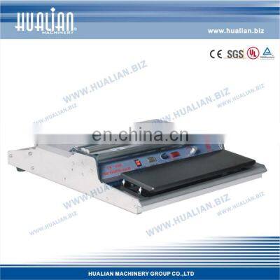 TW-450E HUALIAN Handy Food Tray Wrapping Machine photo-3