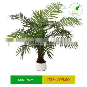 Artificial mini palm tree for indoor decor