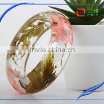 Most elegant women simple design real resin flower bangles wholesale