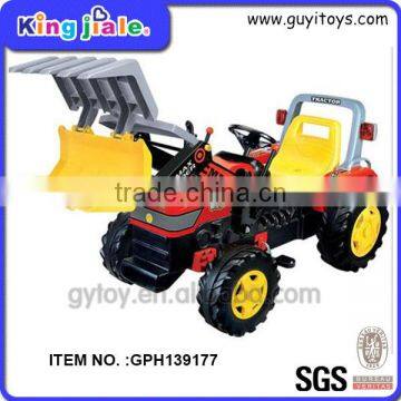 Kid's ride on digging pedal tractor