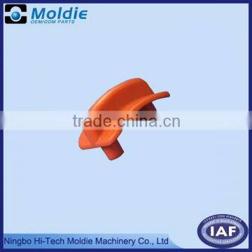 Red plastic button by injection molding