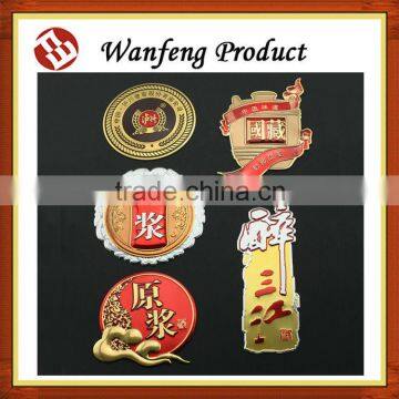 wholesale embossed liquor bottle aluminum label adhesive/sticker