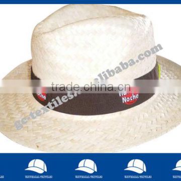 light straw hat with black ribbon